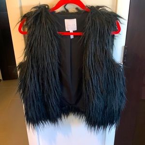 Black fur vest. Leith brand. Size M